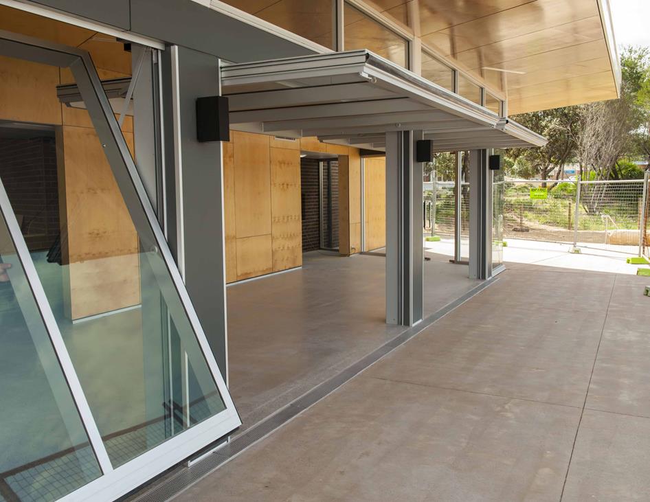 Smartech Vertical Door Systems East, Horizontal Folding Glass Garage Doors